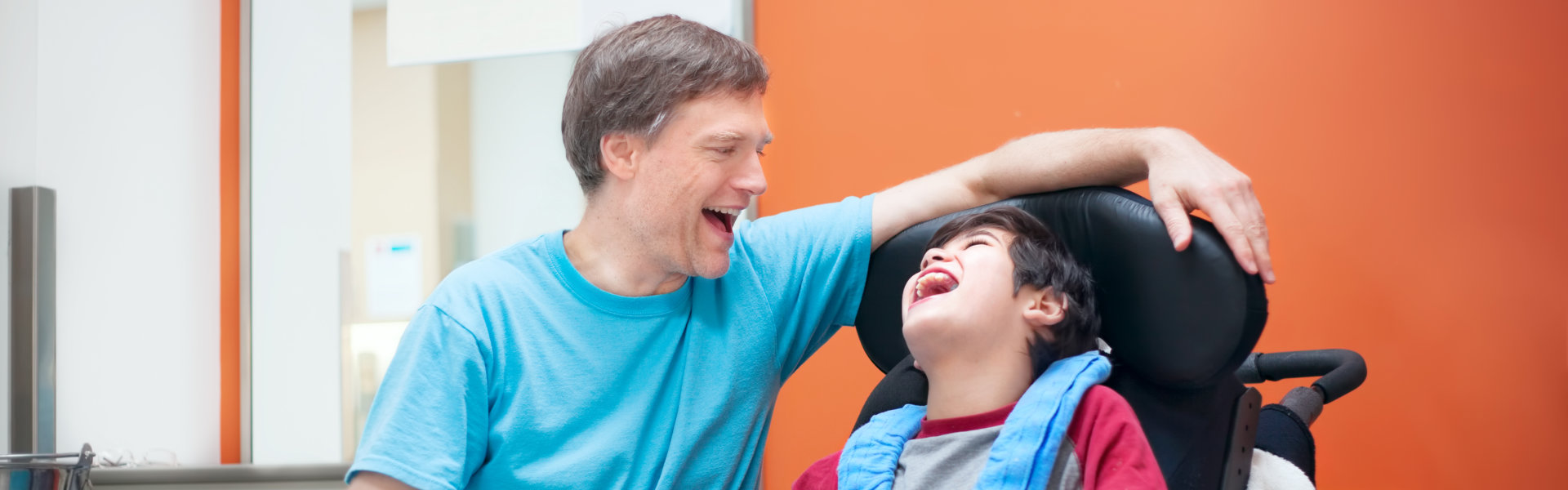 a man and a boy laughing